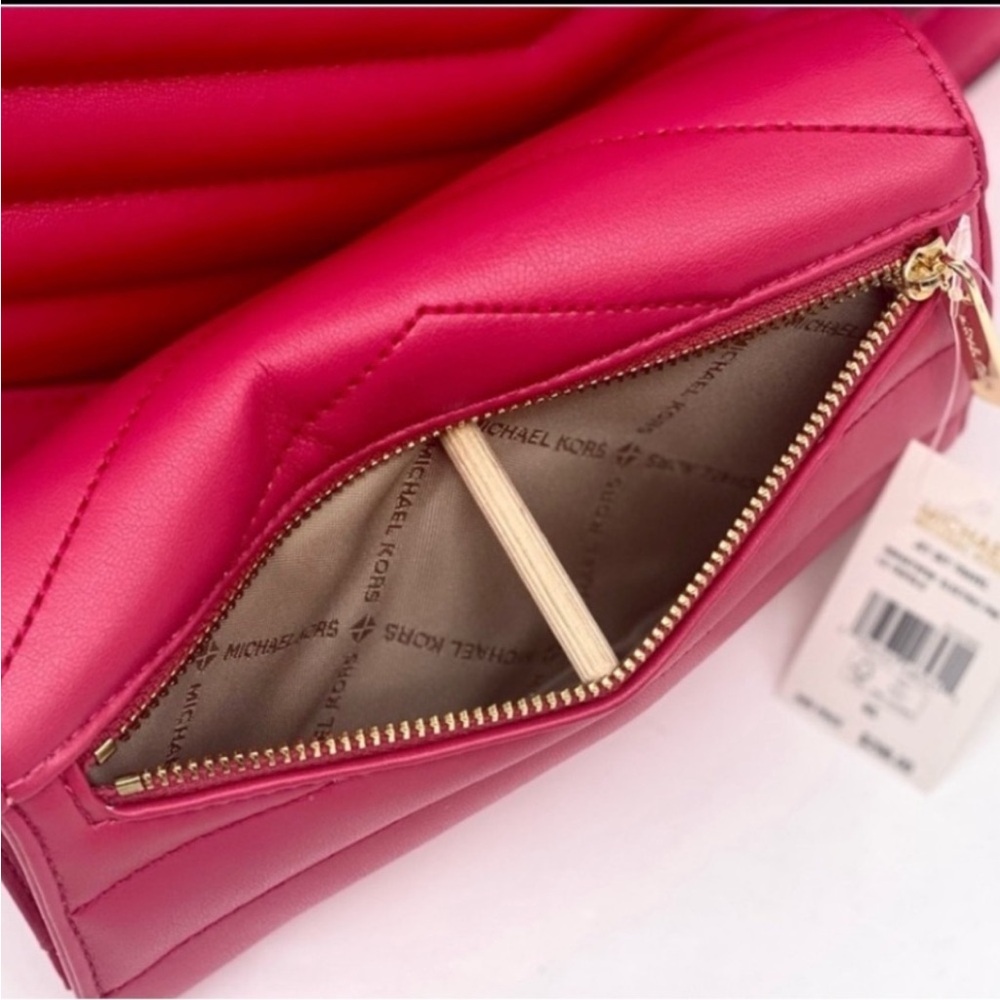 Michael Kors Large Trifold Wallet
Electric Pink - Picture 6 of 8